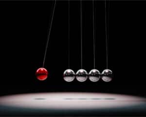 image of metal balls, symbolizing karmic cause and effect